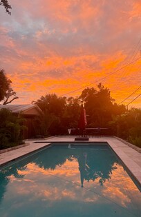 Enjoying a spectacular sunset by the pool.