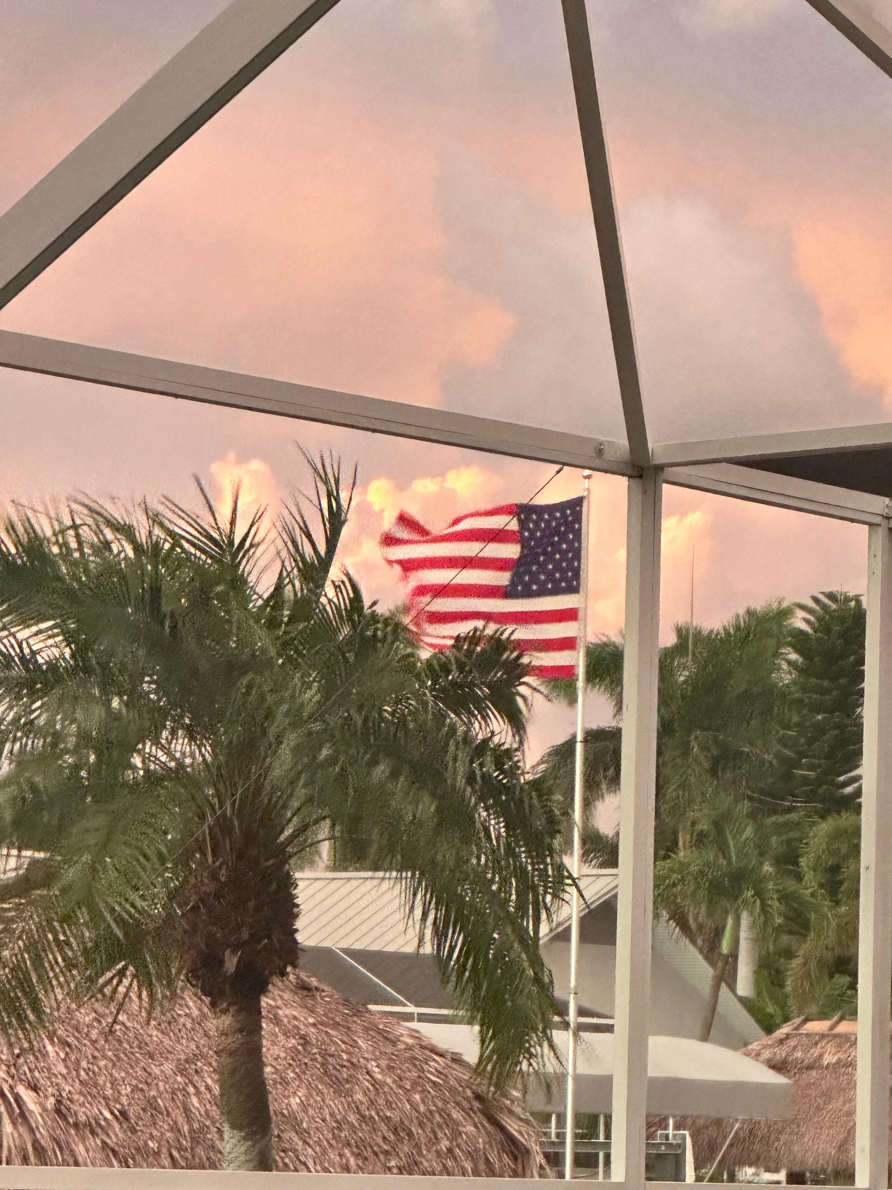 Brian the neighbors flag blowing in the wond