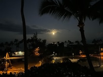 Another beautiful morning with the full moon setting just before sunrise in Kihei.