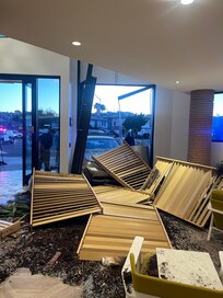 Car crash through front of hotel