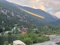 The last little bit of sunshine on the mountains right behind us