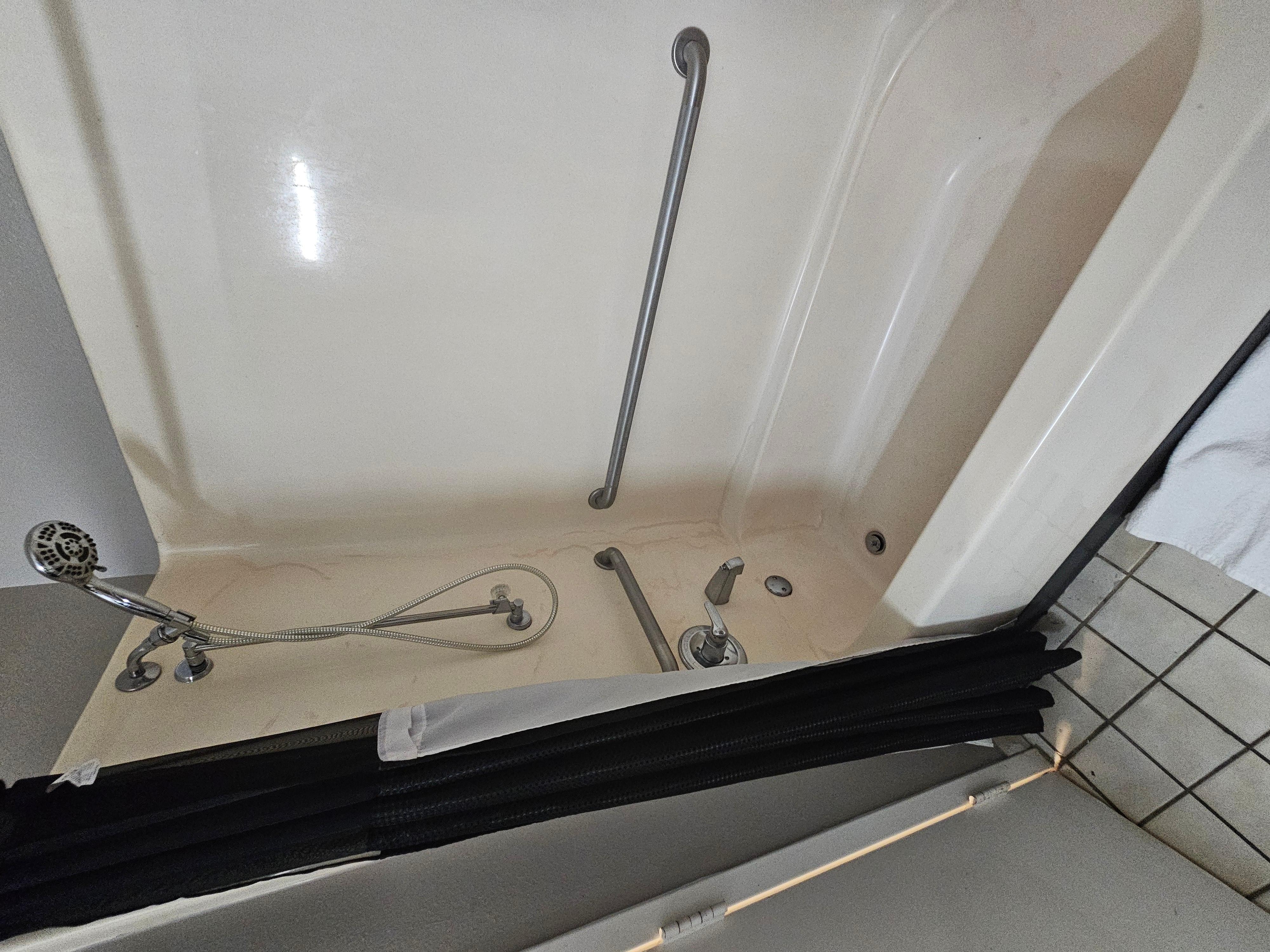 Calcium and dirty looking shower.