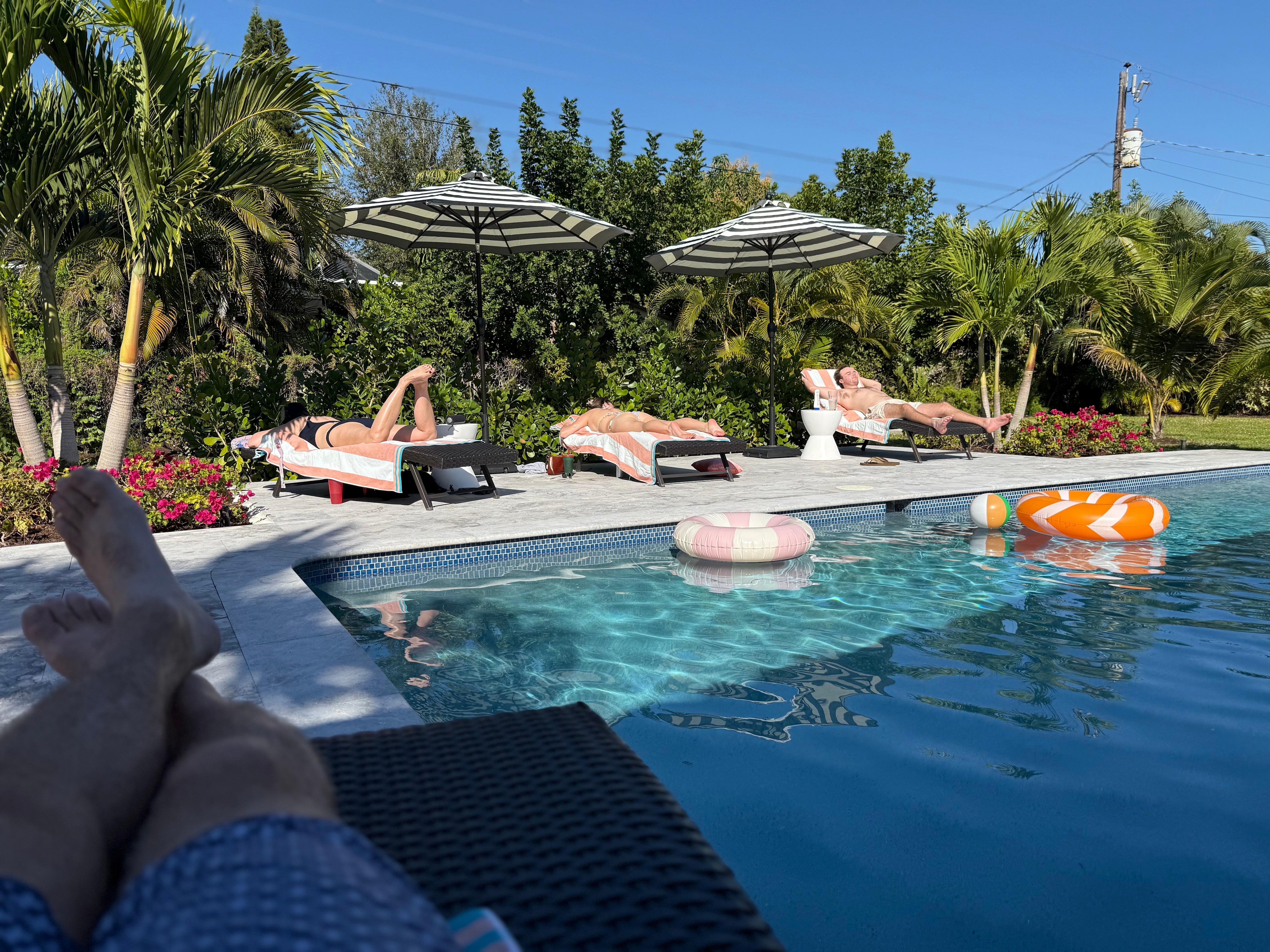 Back yard pool and lounge chairs