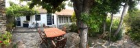 House and terrace area from the back gate.