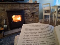 Reading in front of the fire