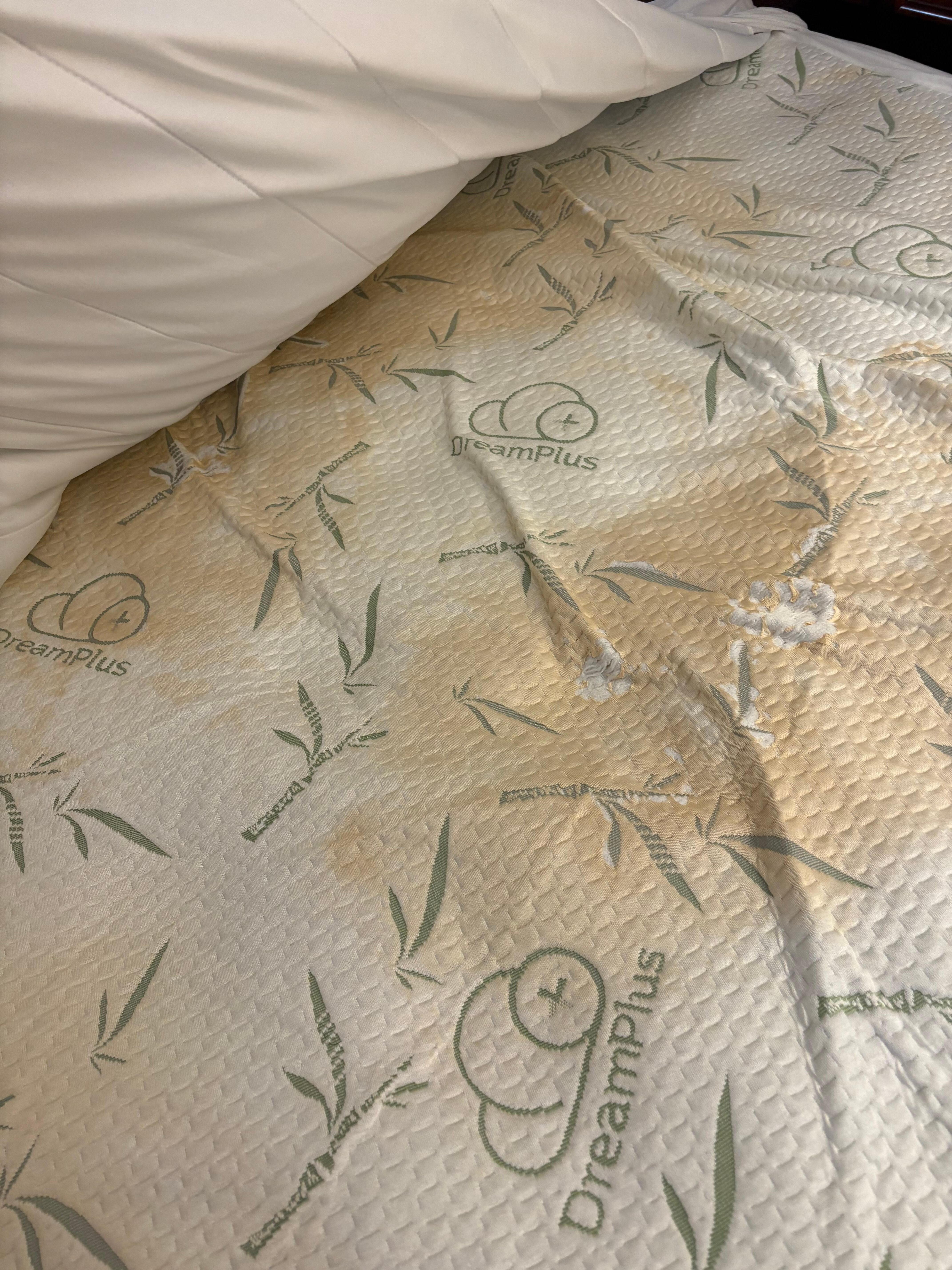 Stained sheets on second bed