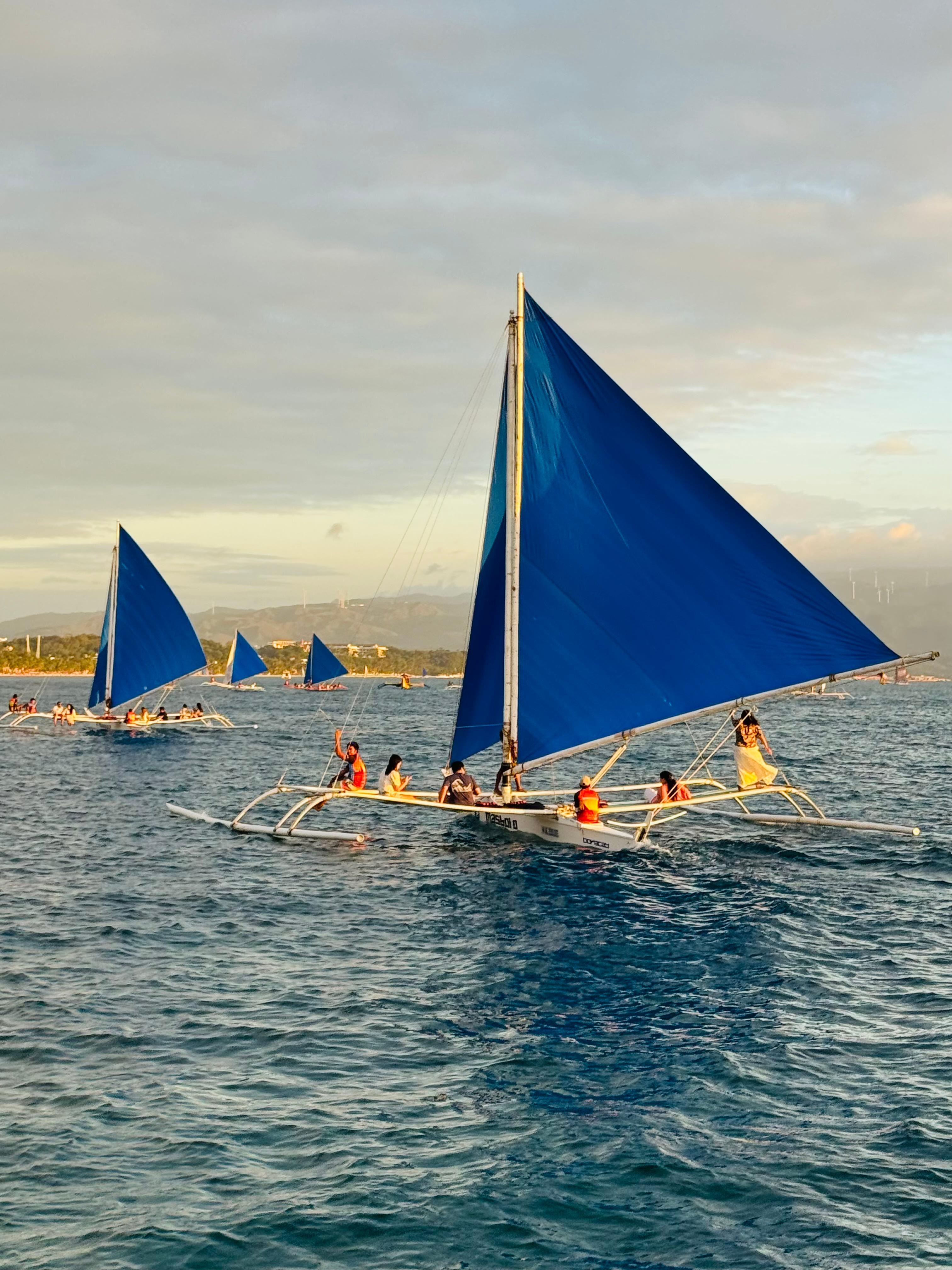 Watching these boats from the beach of the hotel…