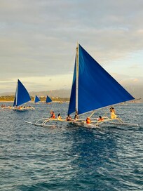 Watching these boats from the beach of the hotel…