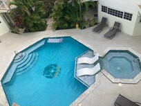 The pool and hot tub in the garden rooms area.
