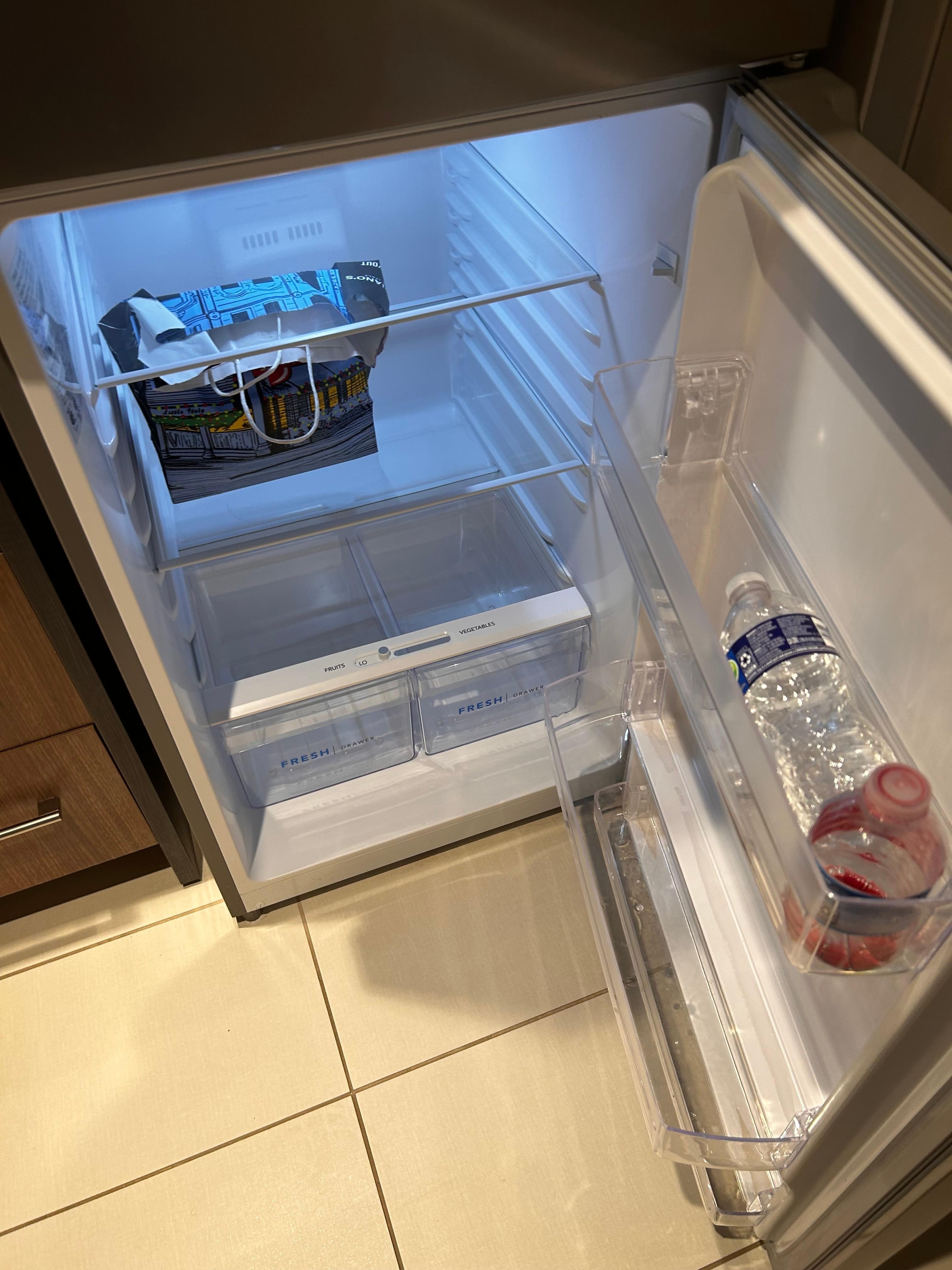 Photo of the fridge that hasn’t been cleaned when we checked in 