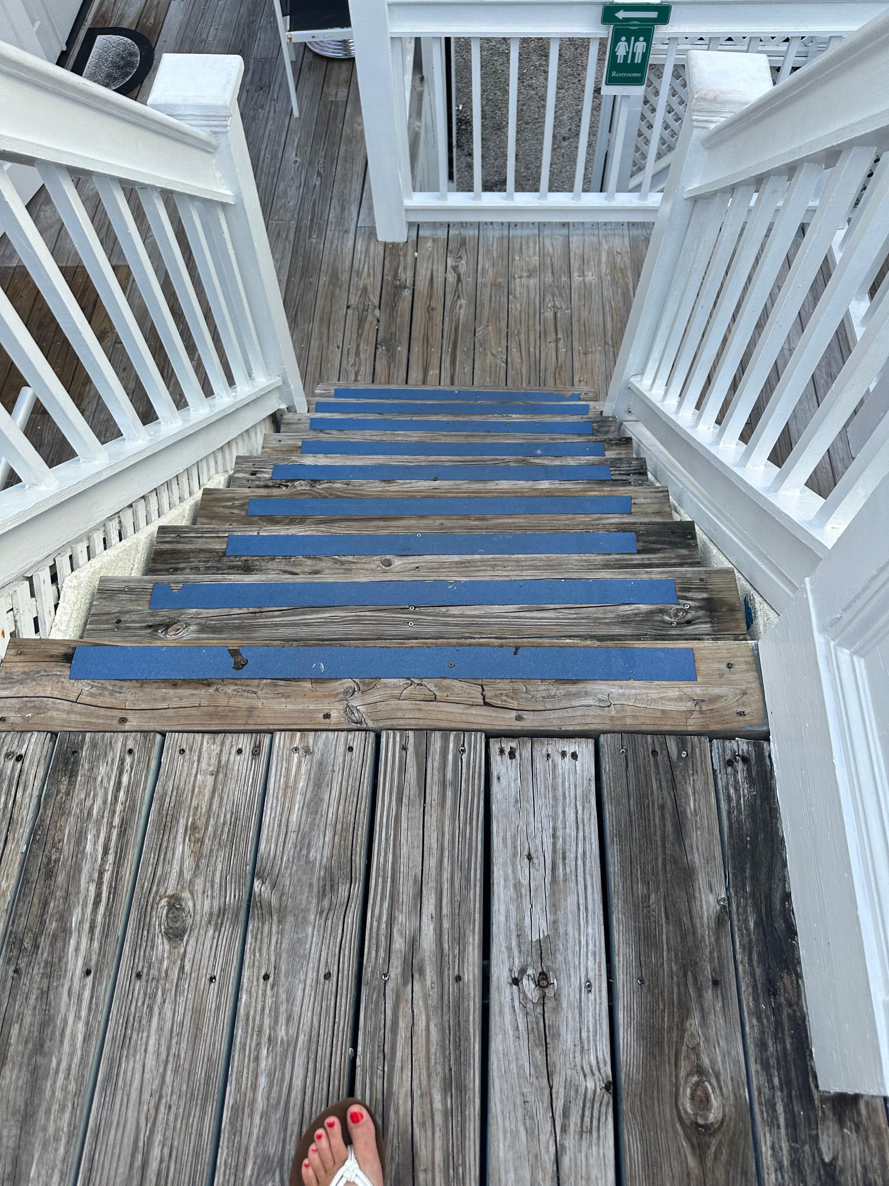 Flight of stairs right outside of 115