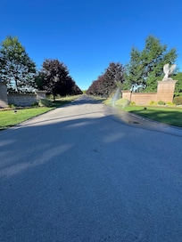 Long beautiful driveway in and out of property