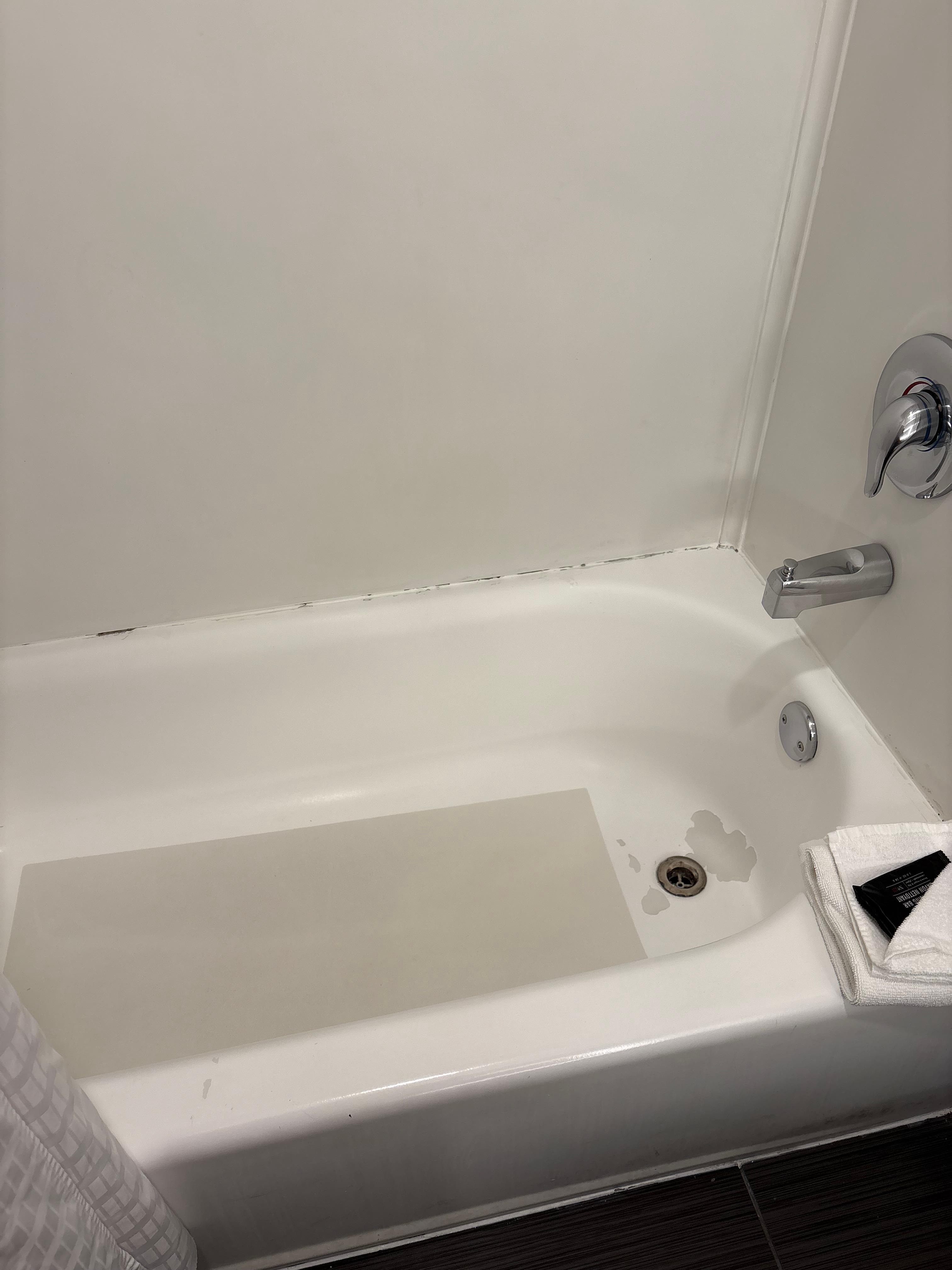 Tub peeling and very narrow, caused foot discomfort for My problem feet. Shower head did not let out an even steady forceful flow. Hot water only in the early morning. Luke warm water thereafter, very uncomfortable.