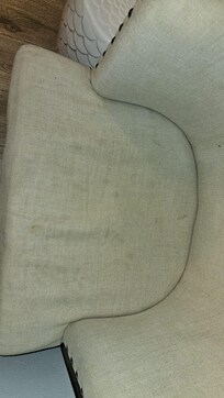soiled living room chair