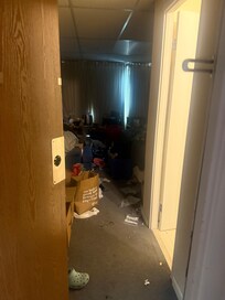 Squatter like conditions in a hotel with paying guests.