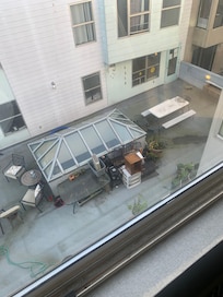 Courtyard of building next door and view from hotel window