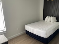 Bed closest to the entrance w/TV