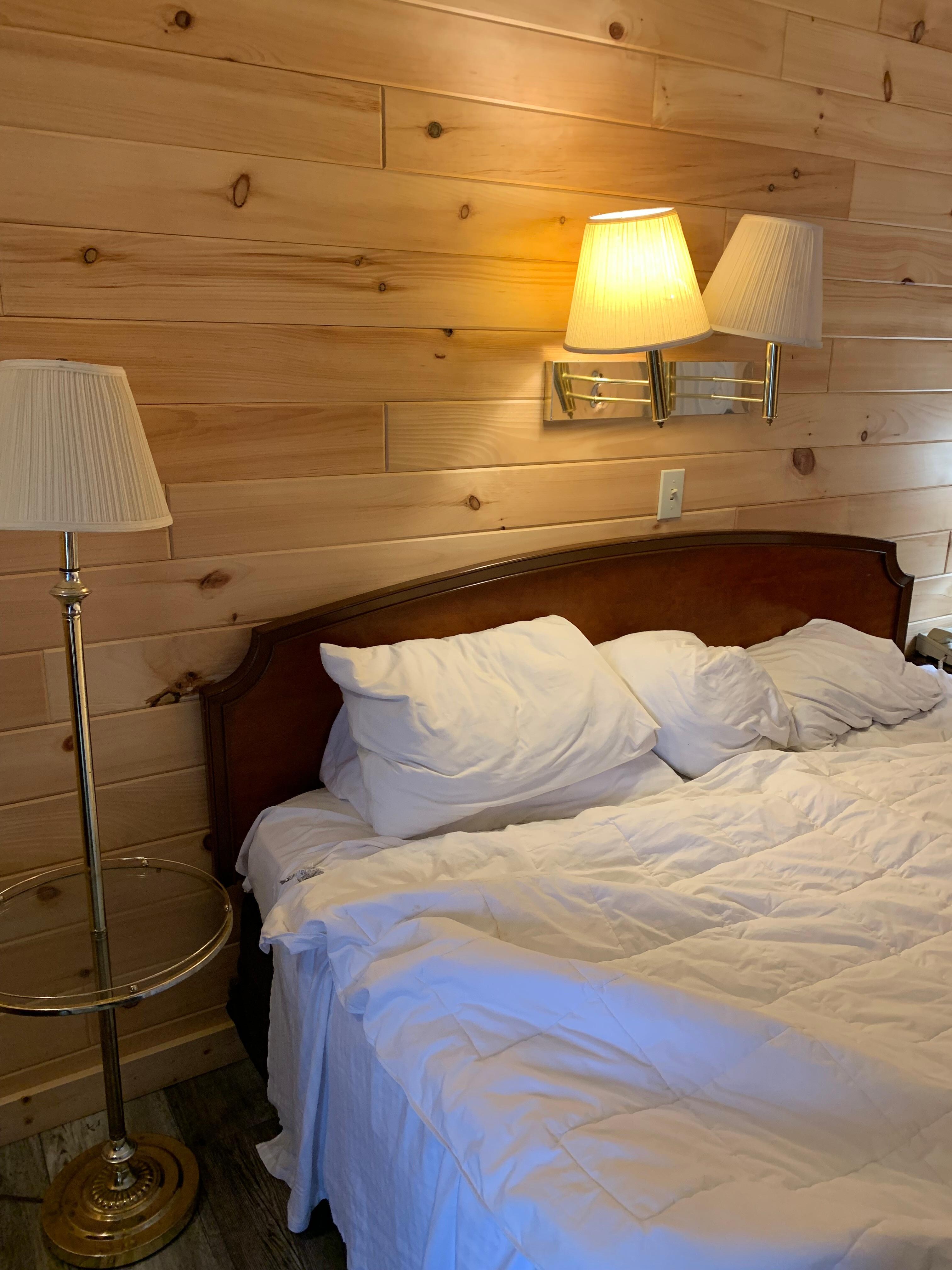 Bed was comfortable, furniture and lighting outdated and used.