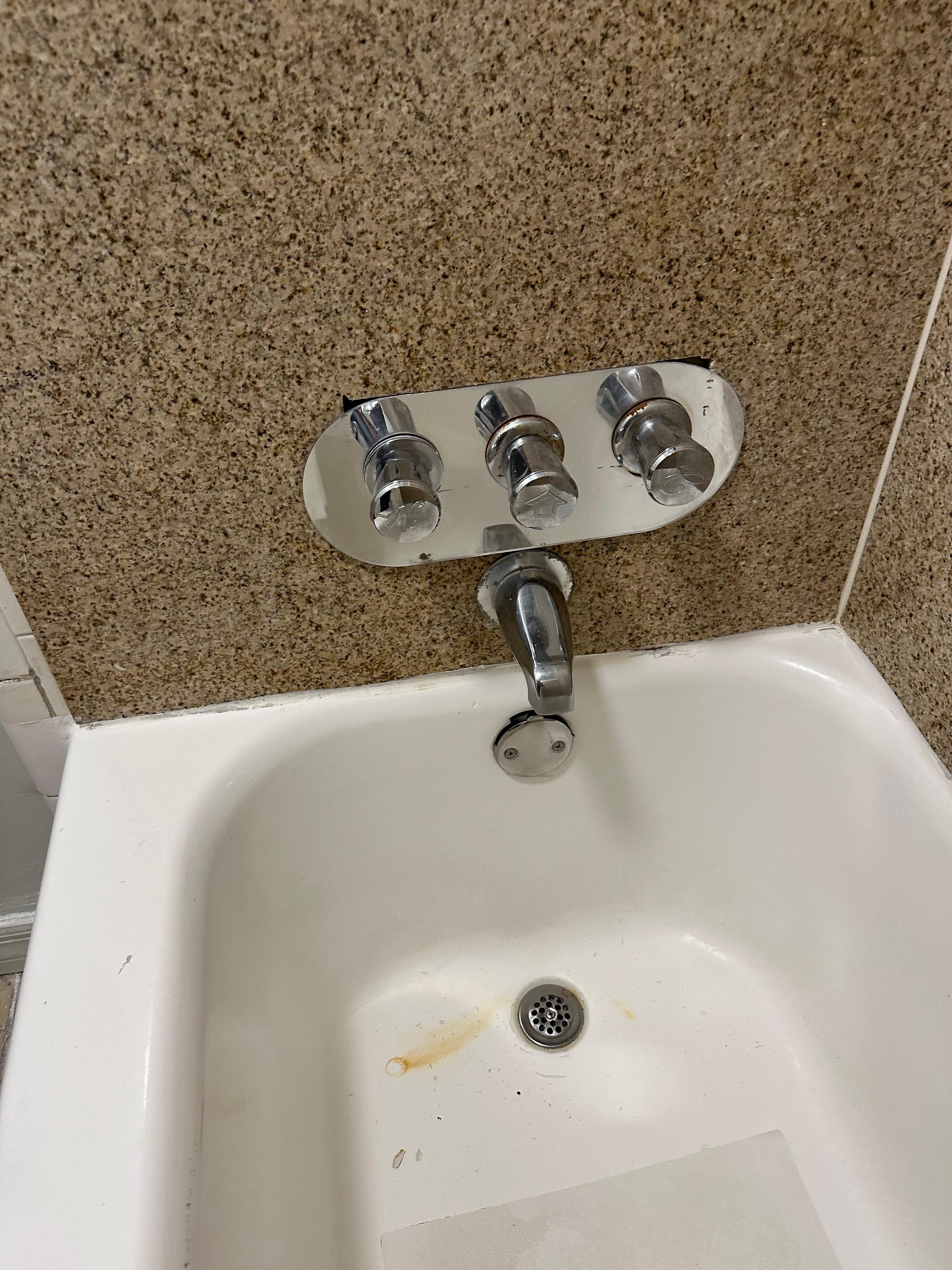 Rust in shower. Shower Control loose