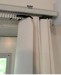 Broken blinds held with electrical tape