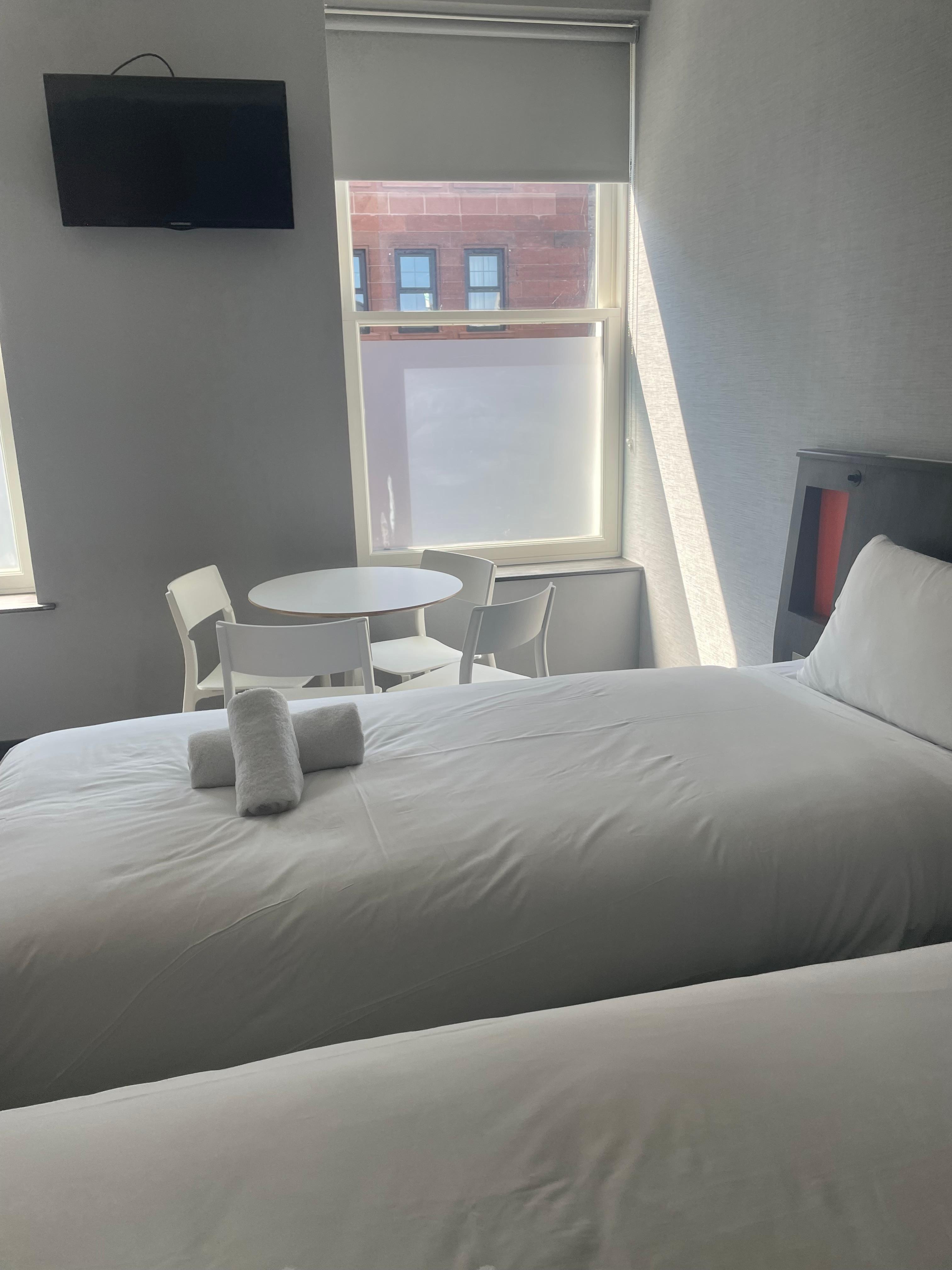 Room had 2 single beds and a double
