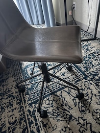 chair was broken you cannot see very well here but if you sat on it the chair would force you forward and was very uncomfortable.