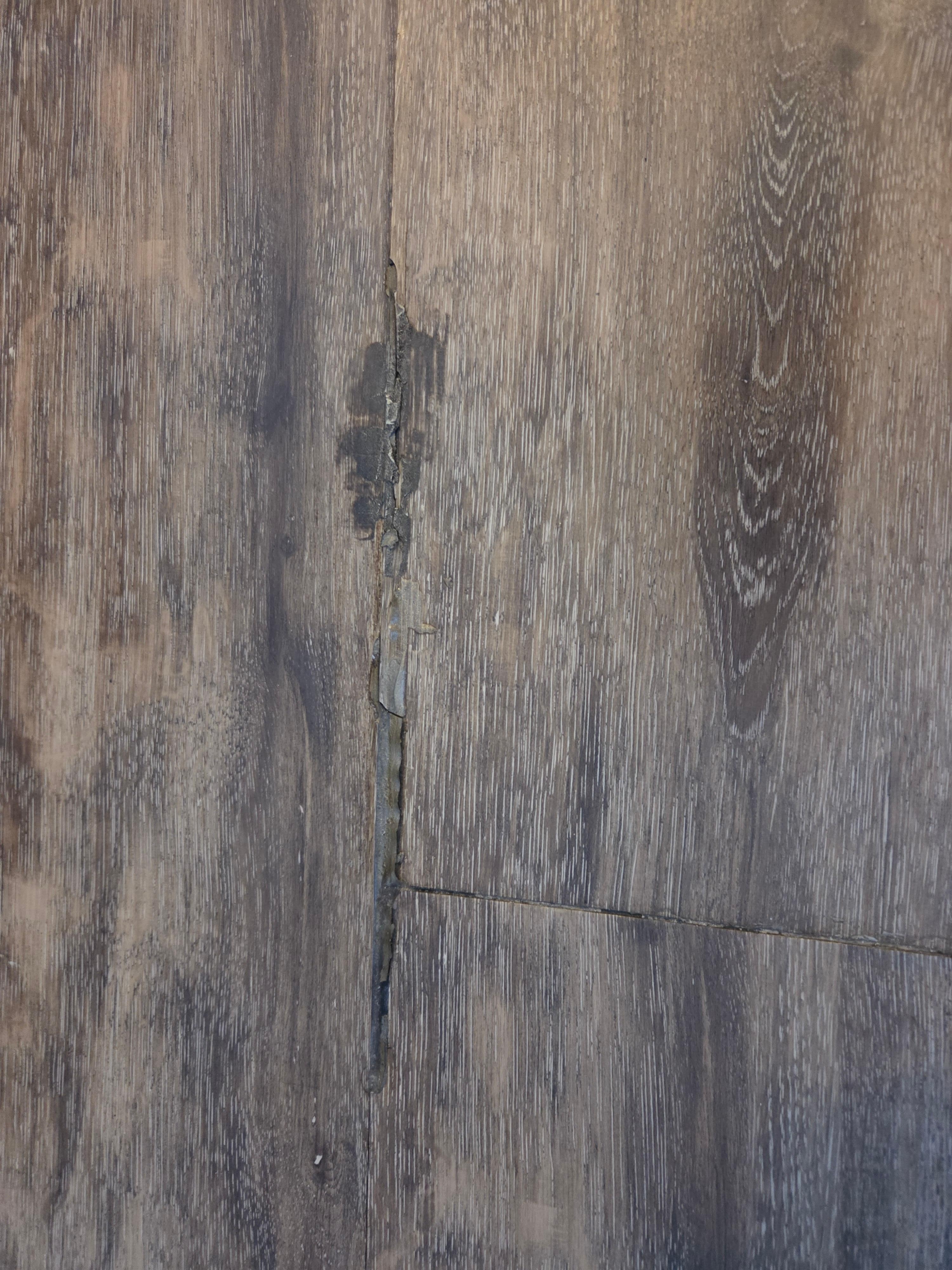 Flooring with old silicone sealant