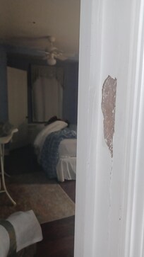 This is Chipping Plaster in my so call room. I think a Flop House On Skid Row may be better than this. And I paid $150.00 a night!!!!