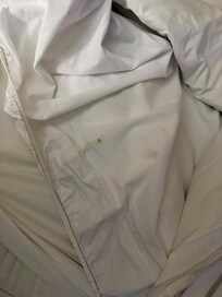 Yellowing/stains on bed and bedding material