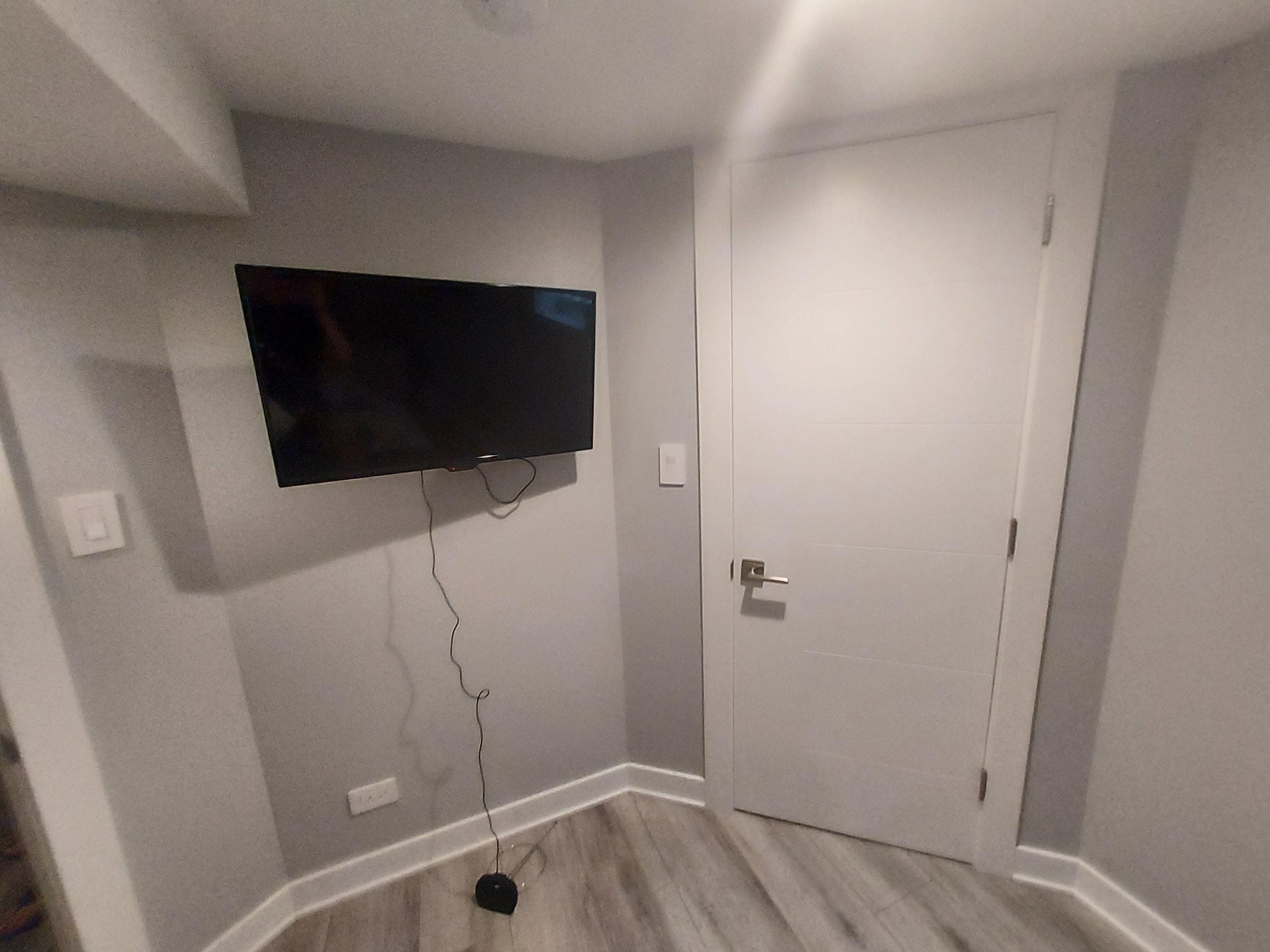 Tv in the bigger bedroom