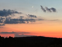 Sunset enjoyed from the terrace at the top of the lot