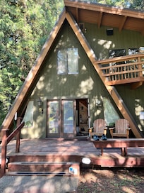 Front view with hot tub on front deck