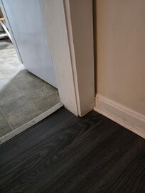 Tack strips lifted in more than one place.