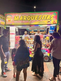 The park is full of families on Saturday night.