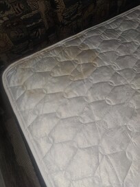 Soiled and stained sofa mattress