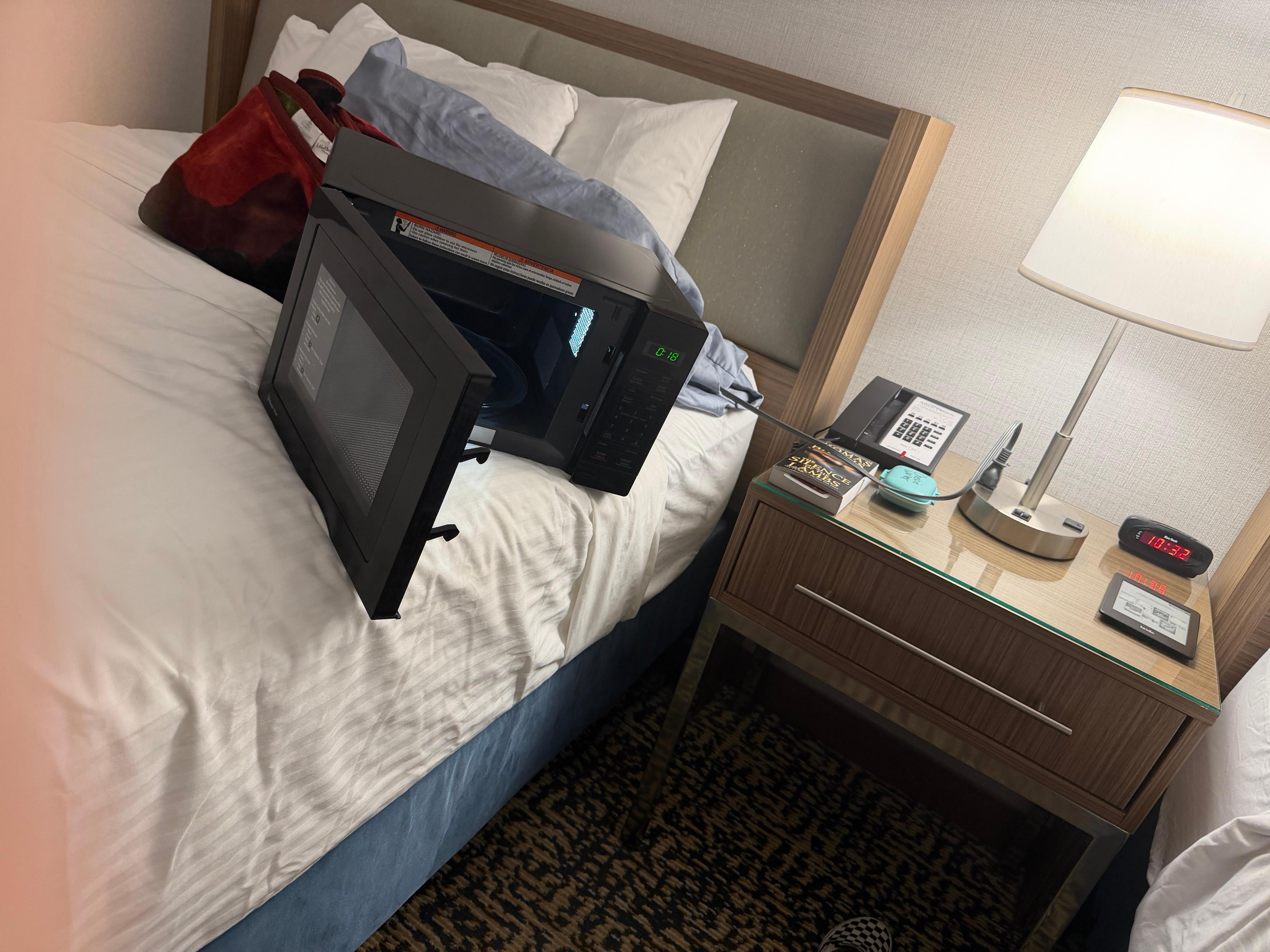 There is no outlet available near the microwave so we had to use the only one we could find on the nightstand 