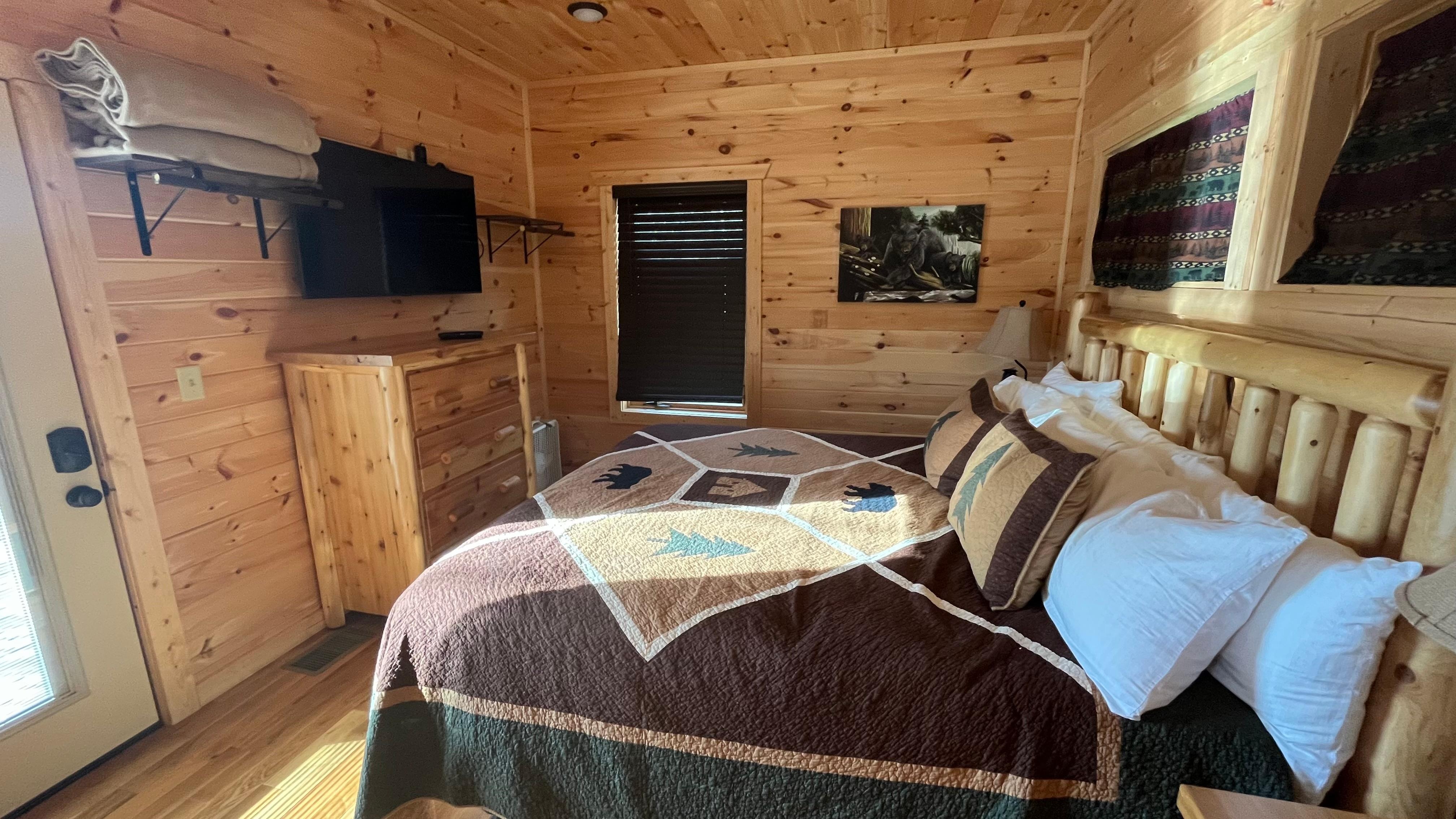 Spacious bedroom with access to one of two balconies.