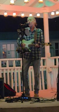 Sunday nights entertainment. Probably the best guitarist on island.