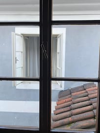 Wall view into a room opposite from bedroom