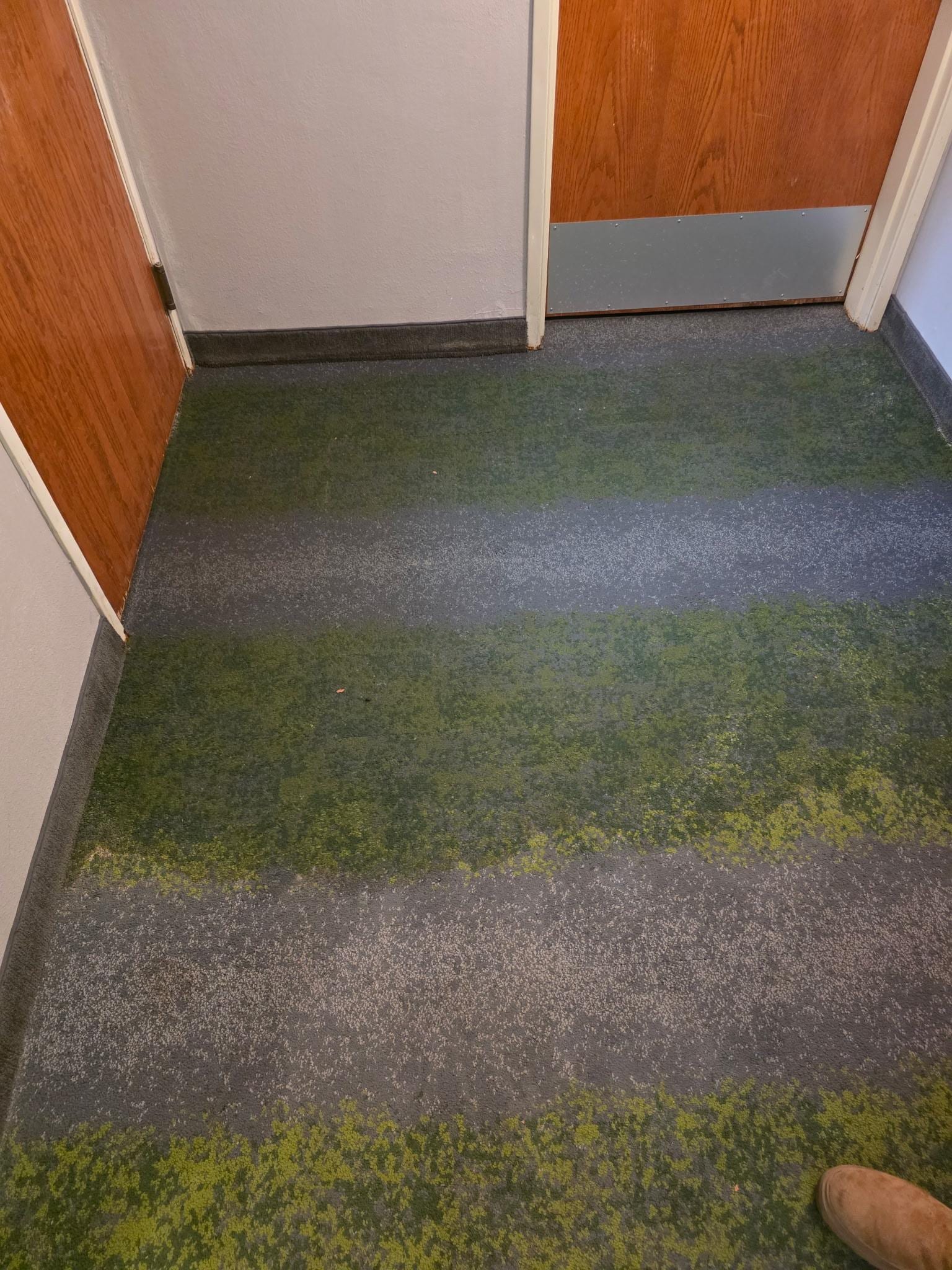 The floor outside of the pool area