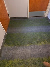 The floor outside of the pool area