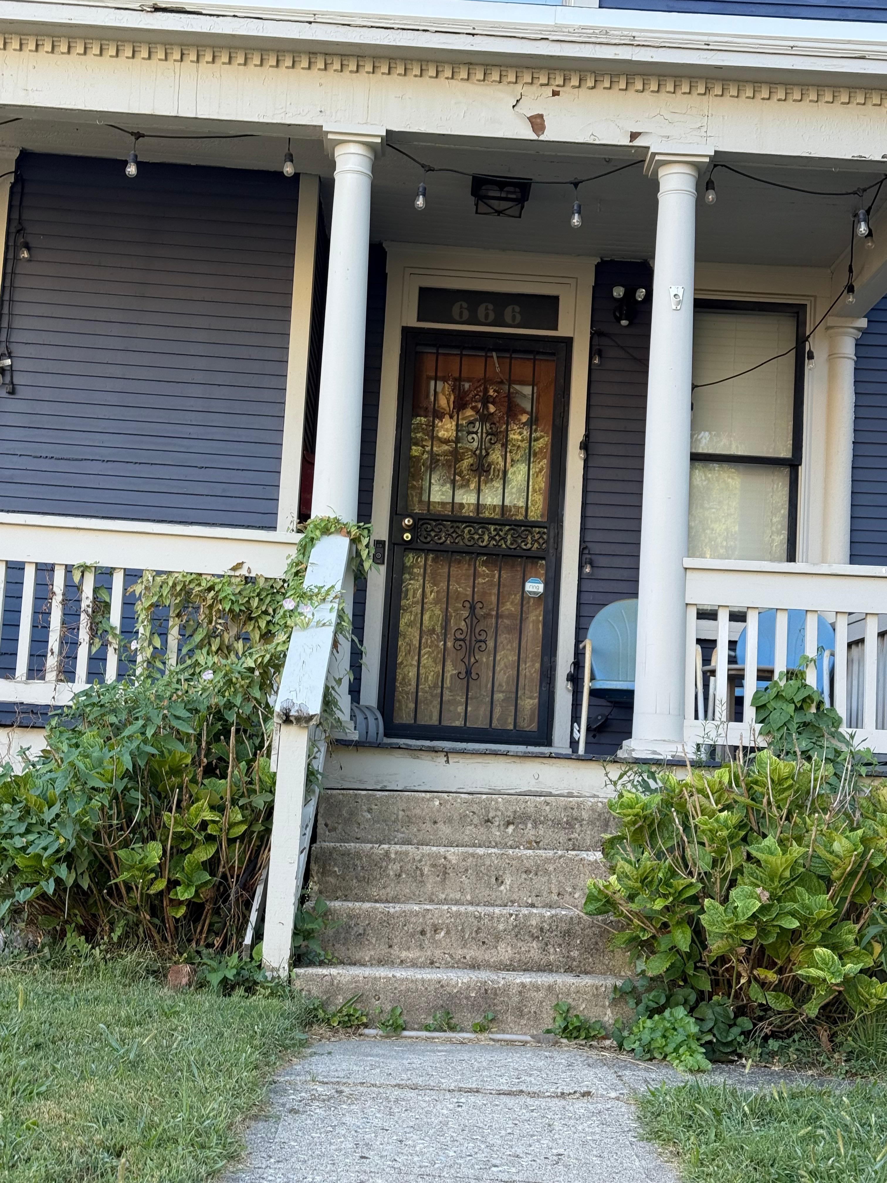 Front of house but enter around back and park in detached garage
