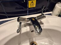 Broken wash basin tap