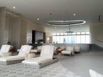 Spa loungers and hydrotherapy room with beautiful view of ocean