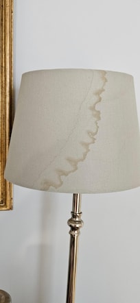 One of the lampshades where water must have dropped at some point.