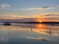 Sunrise on our shared beach.