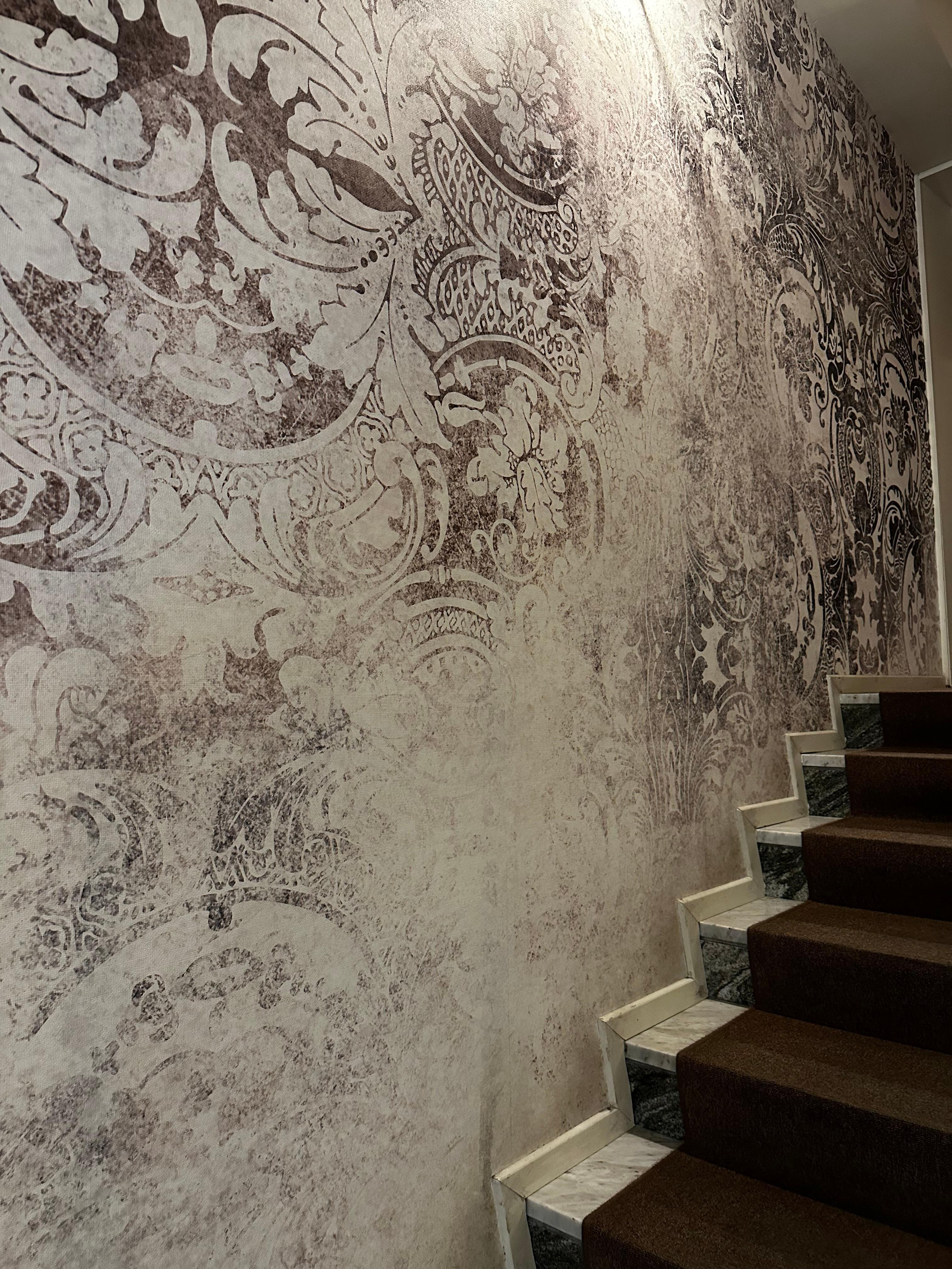 Wallpaper around the stairs took my mind off of the need to walk up a floor!