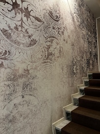 Wallpaper around the stairs took my mind off of the need to walk up a floor!