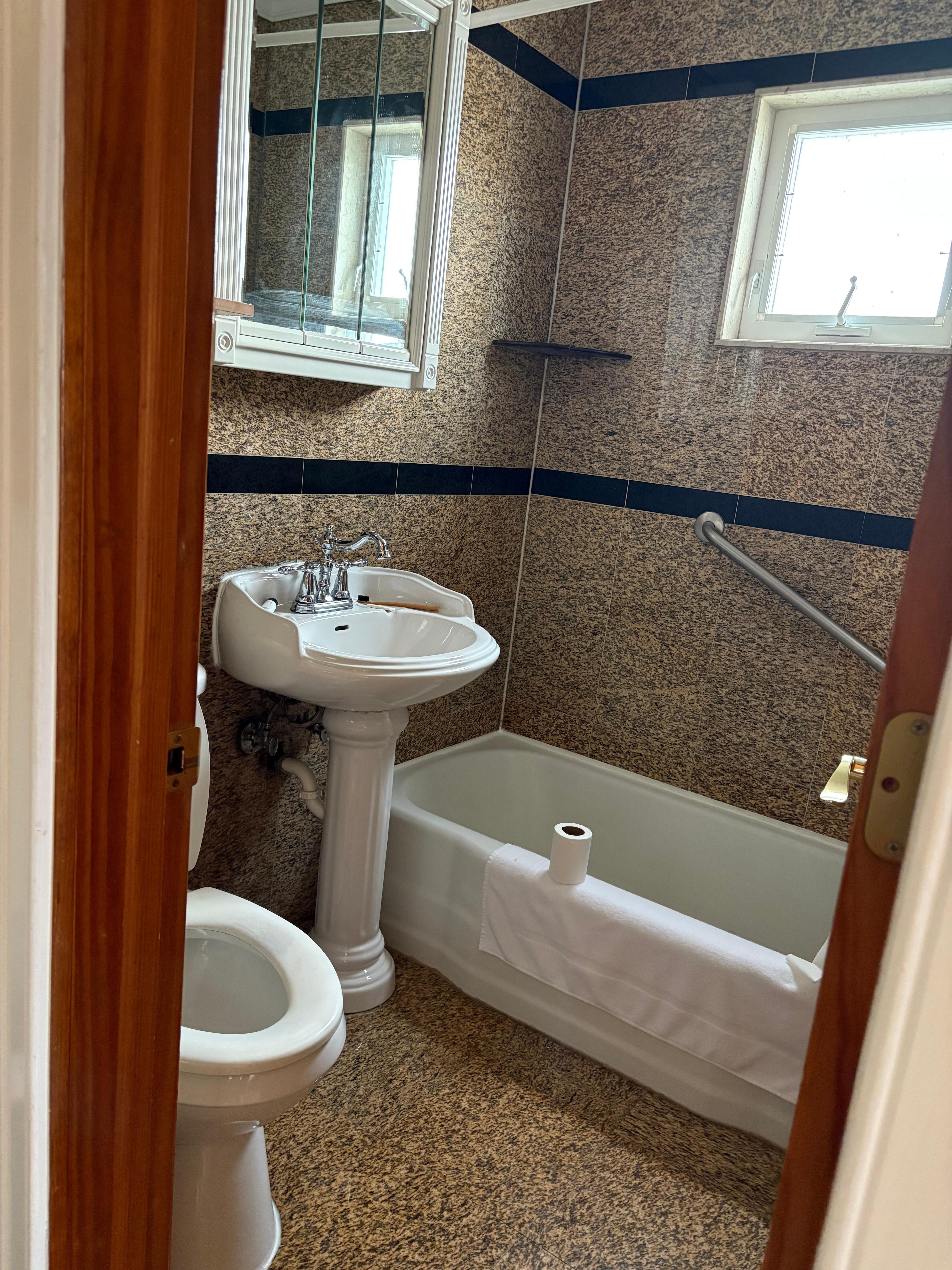 Tiny cramped bathroom