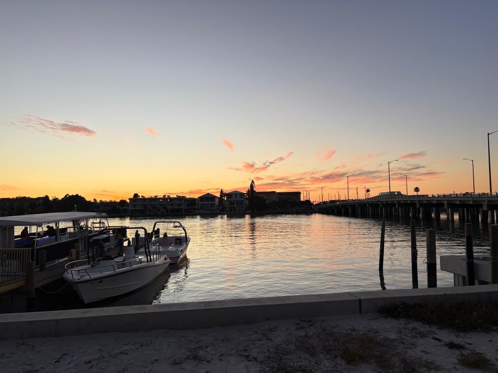 View of sunset from nearby restaurant.  Food in the area is great!